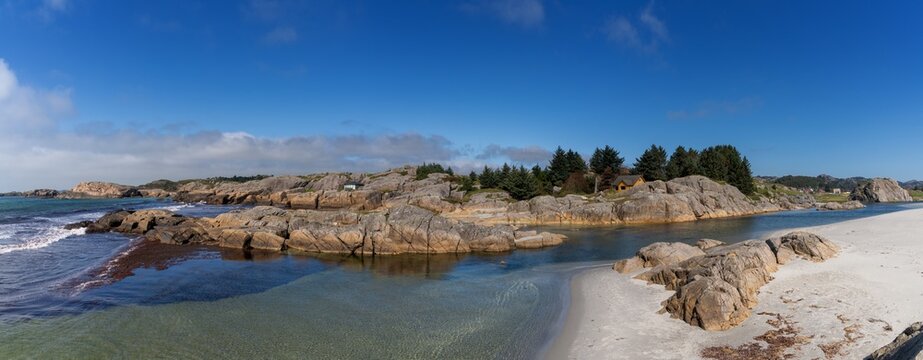 panorama landscape view of the Ognaelva river mouth and the picturesque Ognasanden Beach in southwestern Norway