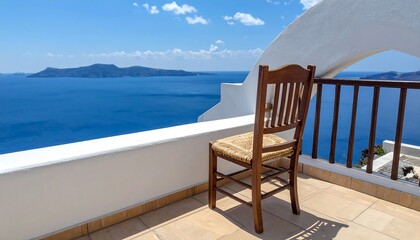 Obraz premium A traditional wooden chair on a whitewashed terrace offering a stunning view of the caldera in Santorini, Greece.