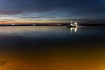 Isla Cristina Huelva Andalusia Spain sunset with fishing boat