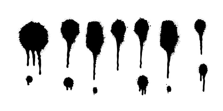 A collection of black spray paint drips and splatters on a white background