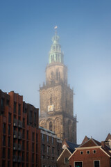 Martinitoren Church Tower Rising Through Morning Fog in Groningen, Netherlands