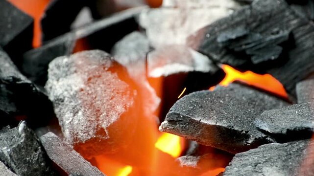 burning charcoal on a barbecue