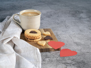 Coffee and cookies at a romantic breakfast with Valentine's Day themed decor
