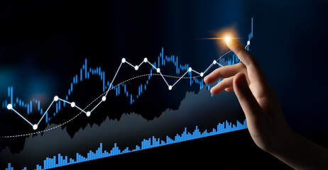 A close-up view of a hand reaching out towards a digital stock market graph, representing financial data analytics and strategy for investment growth and decision-making. Scalp