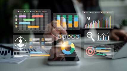 A business professional engages with advanced analytics tools on a smartphone and laptop, highlighting modern data visualization techniques for effective decision-making. Gantry
