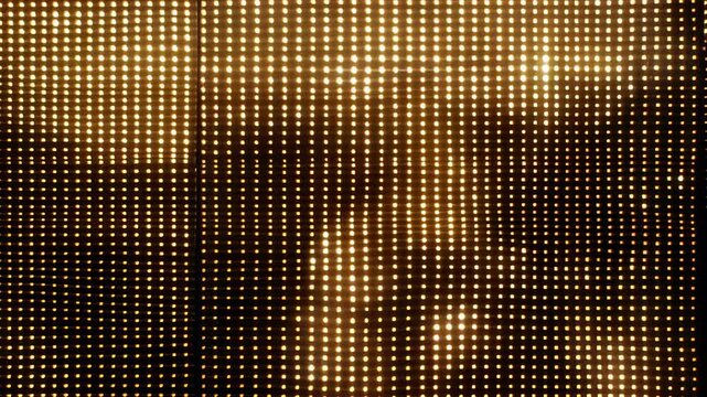 Golden light filtering through a grid pattern with subtle textural variations