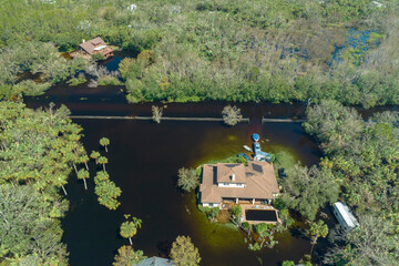 Aftermath of natural disaster. Flooded houses by hurricane Ian rainfall in Florida residential area