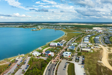 Photovoltaic panels on solar rooftops of Florida commercial buildings for producing clean ecological electrical energy. Renewable electricity with zero emission concept