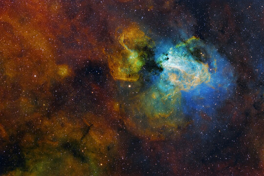 The Omega Nebula (M17, NGC 6618, Swan Nebula) large hydrogen, sulfur and oxygen gas and dust cloud in the constellation of Sagittarius. Amateur image, total exposure SHO time: 13h, HST palette image.