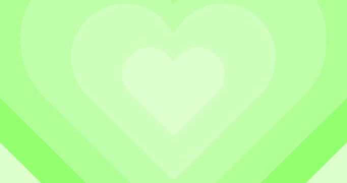 Moving hypnotic green Heart in fast motion. Seamless Psychedelic hearts for Valentines day concept. The 14th of February.