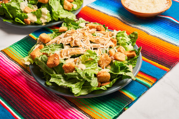 Classic caesar salad with grilled chicken fillet and parmesan cheese.