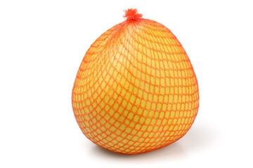 Pomelo. A large piece of fruit in a net bag, bought at the supermarket.