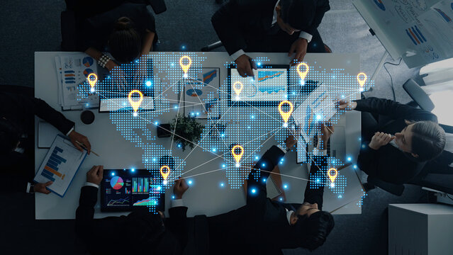 Concept of a global logistics network with location pins on a world map. This represents an international supply chain and distributed business locations for worldwide reach. Fermion