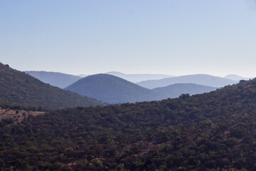 Fototapeta premium Distant view of the blue, concentric ridges, which form the outer rings of the Vredefort Dome in South Africa. 