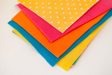 Fototapeta premium Set of colored felt for creativity. Soft focus. Nonwoven fabric cloth