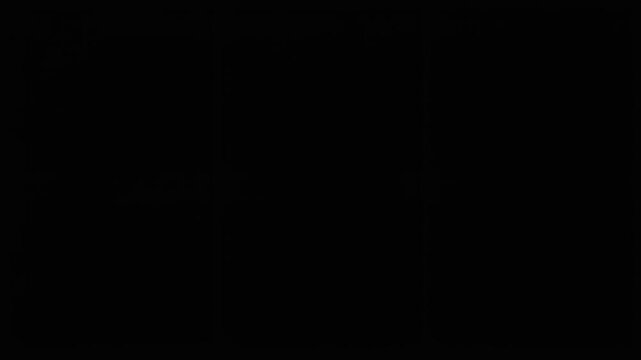 A black image with faint text in the bottom left corner