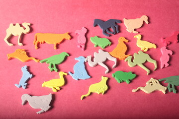 animals toys on a red background