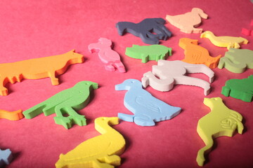 animals toys on a red background