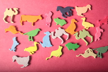 animals toys on a red background