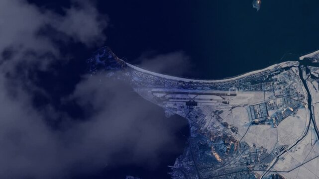 Wonsan coastal city and airport at sunrise, satellite view flying over North Korea animation based on NASA imagery