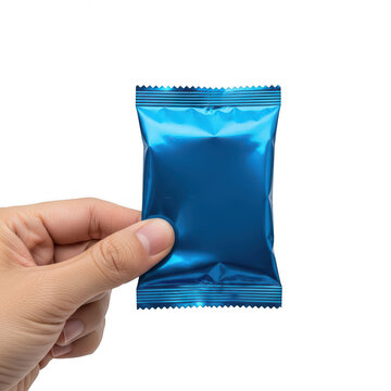 Hand holding blue packet isolated on transparent background