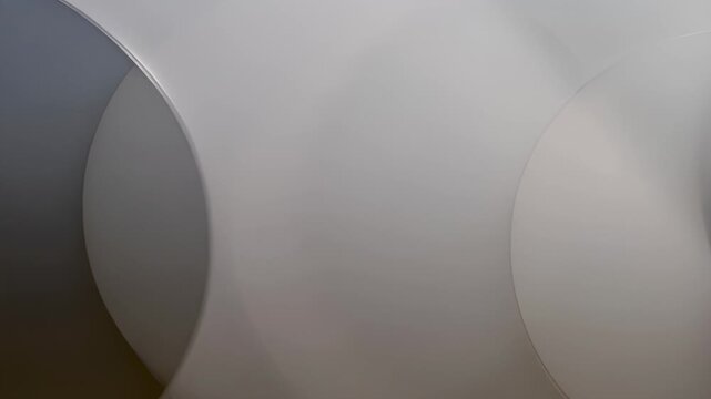 Soft abstract background with overlapping circular shapes and gentle gradients