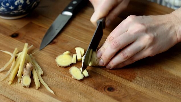 Detailed 4K close up of sliced ginger root laid out on table showing fibrous texture freshness commonly used cooking natural 