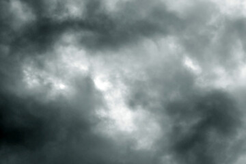 Obraz premium Dark storm sky with dramatic fluffy clouds. Cloudscape rainy season. Thunderstorm climate weather. Pollution smoke PM 2.5 Cabo dioxide concept. Scary Halloween.