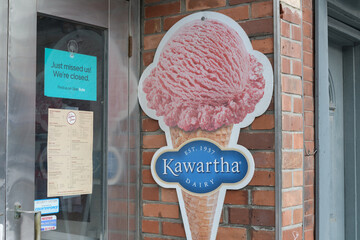 Obraz premium menu on the door of Avenue Diner incl ice cream cone advertising logo sign for Kawartha Dairy, 222 Davenport Rd, Toronto