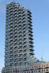 Obraz premium exterior of Monde Condominiums, a condominium complex, located at 12 Bonnycastle St (seen from Queens Quay E), Toronto
