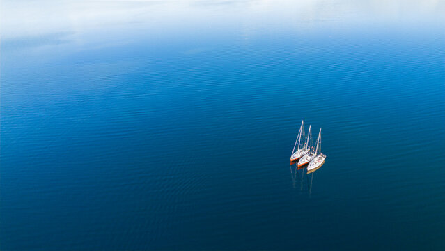 Tranquil sailing boats on Lofoten's serene waters