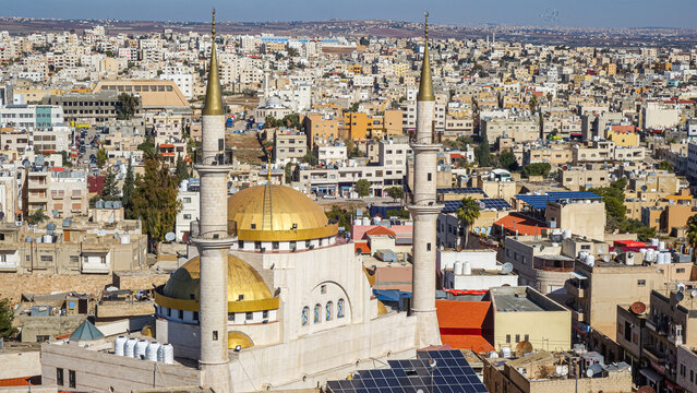 Panoramic view of Madaba cityscape with Mosque