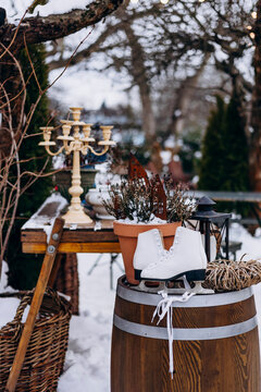 Winter garden decor with skates and rustic elements