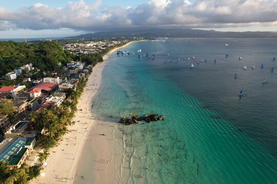 Drone Shot of Boracay Station 1 Coastline with Paraw Boats and Willy's Rock - 3