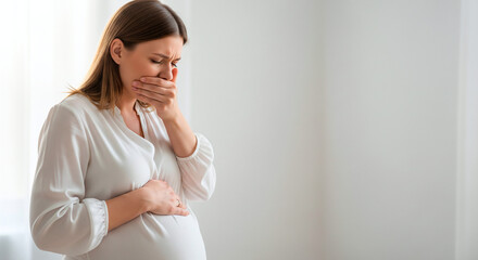 Fototapeta premium Pregnant woman experiencing nausea and morning sickness, holding her stomach and covering her mouth