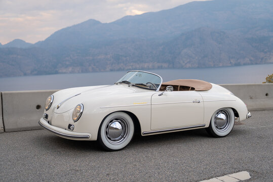 1957 Porsche 356 Speedster replica parked in the evening on a scenic overlook in the Okanagan Valley