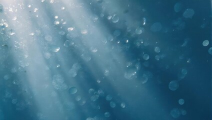 Underwater Light Rays and Bubbles - A Serene Aquatic Scene.
