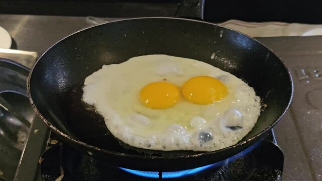 This is a sunny-side-up egg at pan