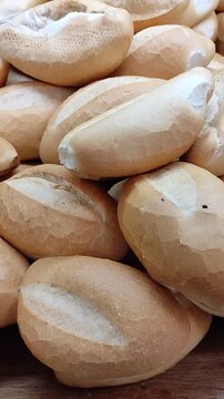 Delicious bolillo breads in a traditional Mexican bakery.Deliciosos panes de bolillos en una panader&iacute;a tradicional mexicana.(20).