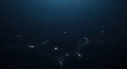 Abstract underwater scene with luminous particles and deep blue background