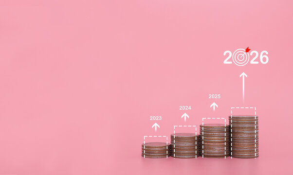 Stack of coins with arrow rising. The concept of business growth, Financial investment, Market stock, Profit return, Dividend and Business fund in year 2026