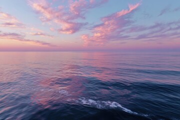 Fototapeta premium Serene Ocean Sunset with Pink Clouds Reflection