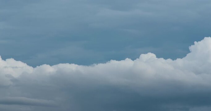 Timelapse of thick clouds rolling over Bandung city, Indonesia