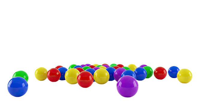Scattered colorful plastic balls on a white background