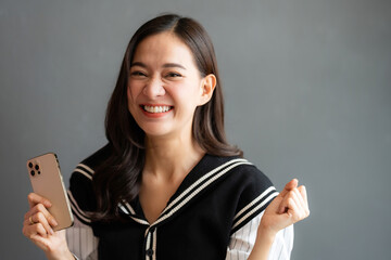 An Asian female online seller expands her business by refining shipping systems, understanding industry logistics deeply, and building reliable digital operations for sustainable growth