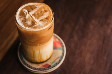 cafe lifestyle scene featuring iced latte