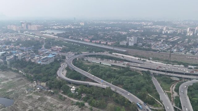 Aerial view of Running Traffic on flyover road near Majnu ka Tilla, New Delhi, India
