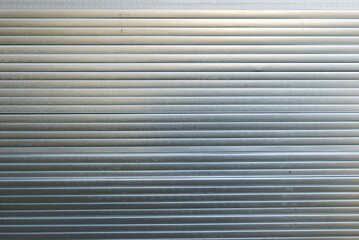 Fototapeta premium silver metallic background with horizontal lines and industrial ribbed texture