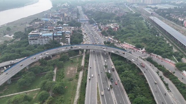 Aerial view of Running Traffic on flyover road near Majnu ka Tilla, New Delhi, India
