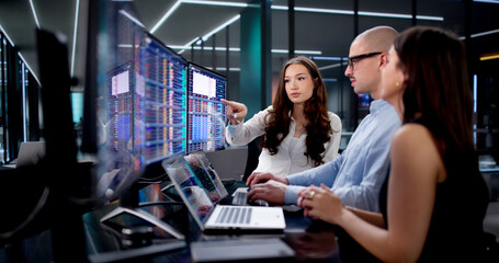 Caucasian Data Analyst Using Spreadsheet On Desktop